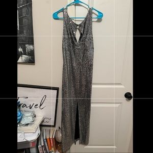 Very pretty silver shiny slit long dress never worn